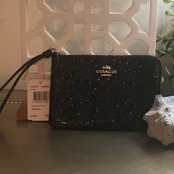 Coach Handbags - COACH BLACK EMBOSSED PATENT LEATHER WRISTLET